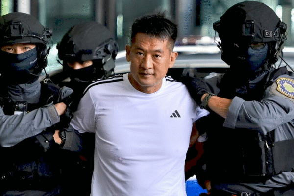 Ше Чжицзян під час екстрадиції
