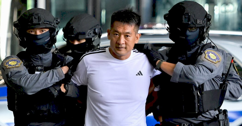 Ше Чжицзян під час екстрадиції